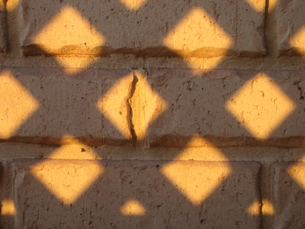 Seeing the wall through the fence